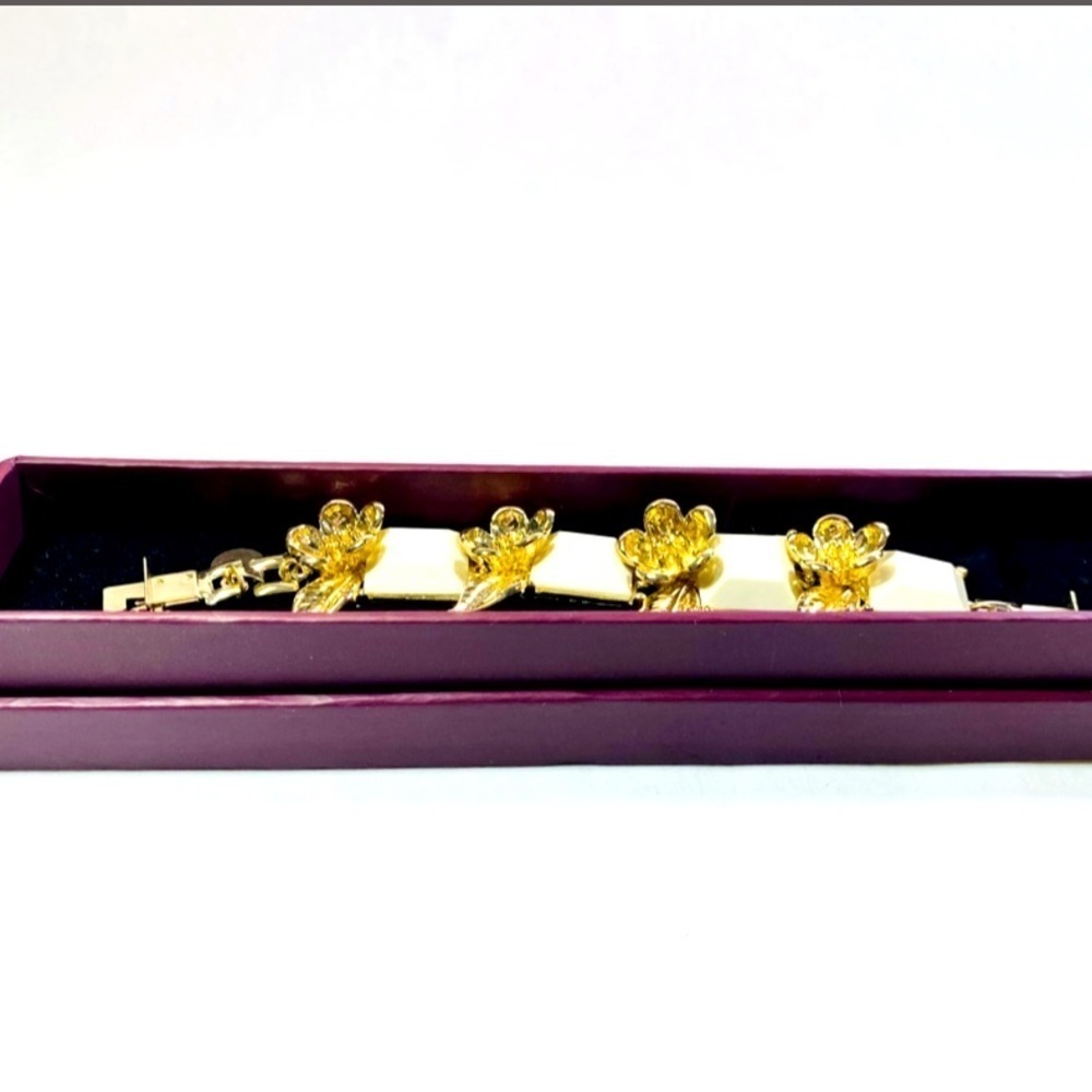 COPY - Karen Walker Designer Floral Cuff, gold tone flowers and white enamel NIB